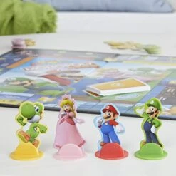 Monopoly Junior Super Mario Edition Board Game, Fun Kids' Ages 5 And Up, Explore The Mushroom Kingdom As Mario, Peach, Yoshi, Or Luigi (Amazon Exclusive) -Play Nest Game 4166XgKN3aL